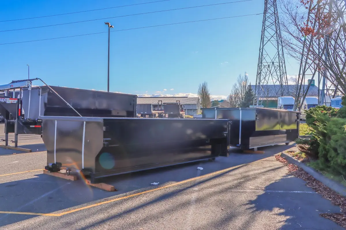 Roll-off dumpster ready for waste disposal at job site for 3 Yard Dumpster Rental in Edgerton